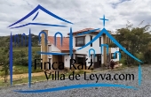vista de la casa desde el parqueadero